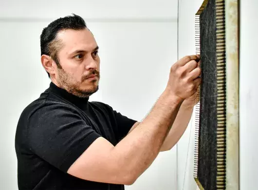 Woven art: Tec employee amazes people with his string pictures