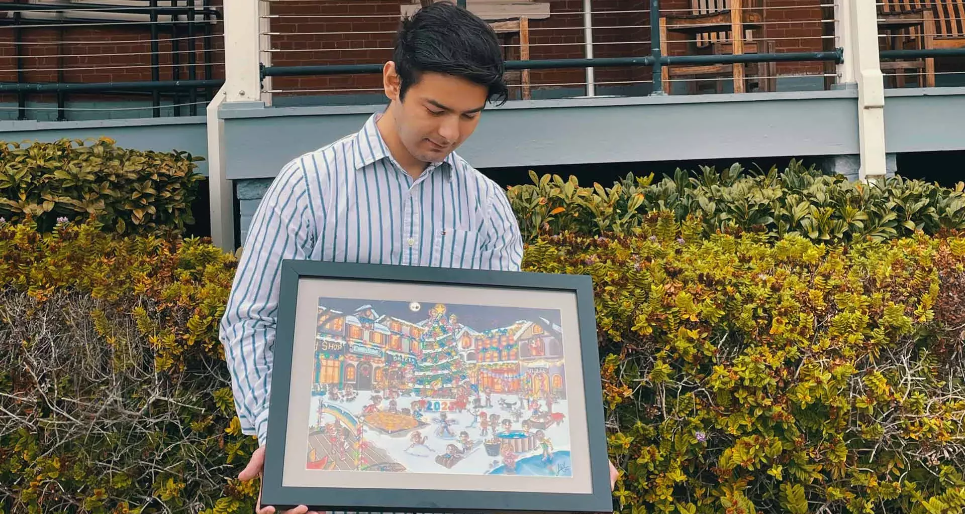 Alex Carrillo presents two of his works in the Spirit of the Season exhibit at the Walt Disney Family Museum