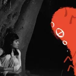 Protagonista de Claroscuro con su pintura de creatura roja.